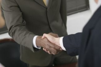 Handshake between insurance underwriter and policyholder