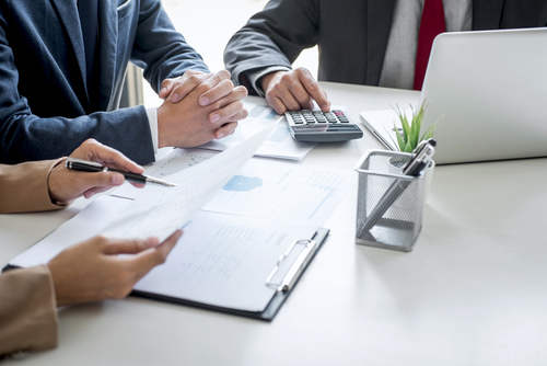 Group of partner working conversation, Business team meeting present with investor colleagues discussing plan financial graph data and analyzing strategy to growth up to profit into company.